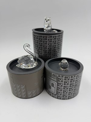 Lot 812 - Three Swarovski crystal figures: Swan, Chick...
