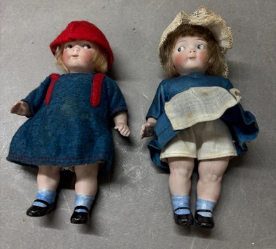 Lot 813 - A pair of German Bisque porcelain miniature...