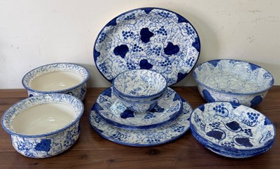 Lot 364 - A part set of Poole pottery featuring a floral...